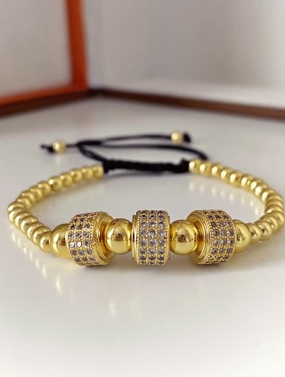 Bratara dama model deosebit cu margele aurii si cercuri cu pietricele stralucitoare