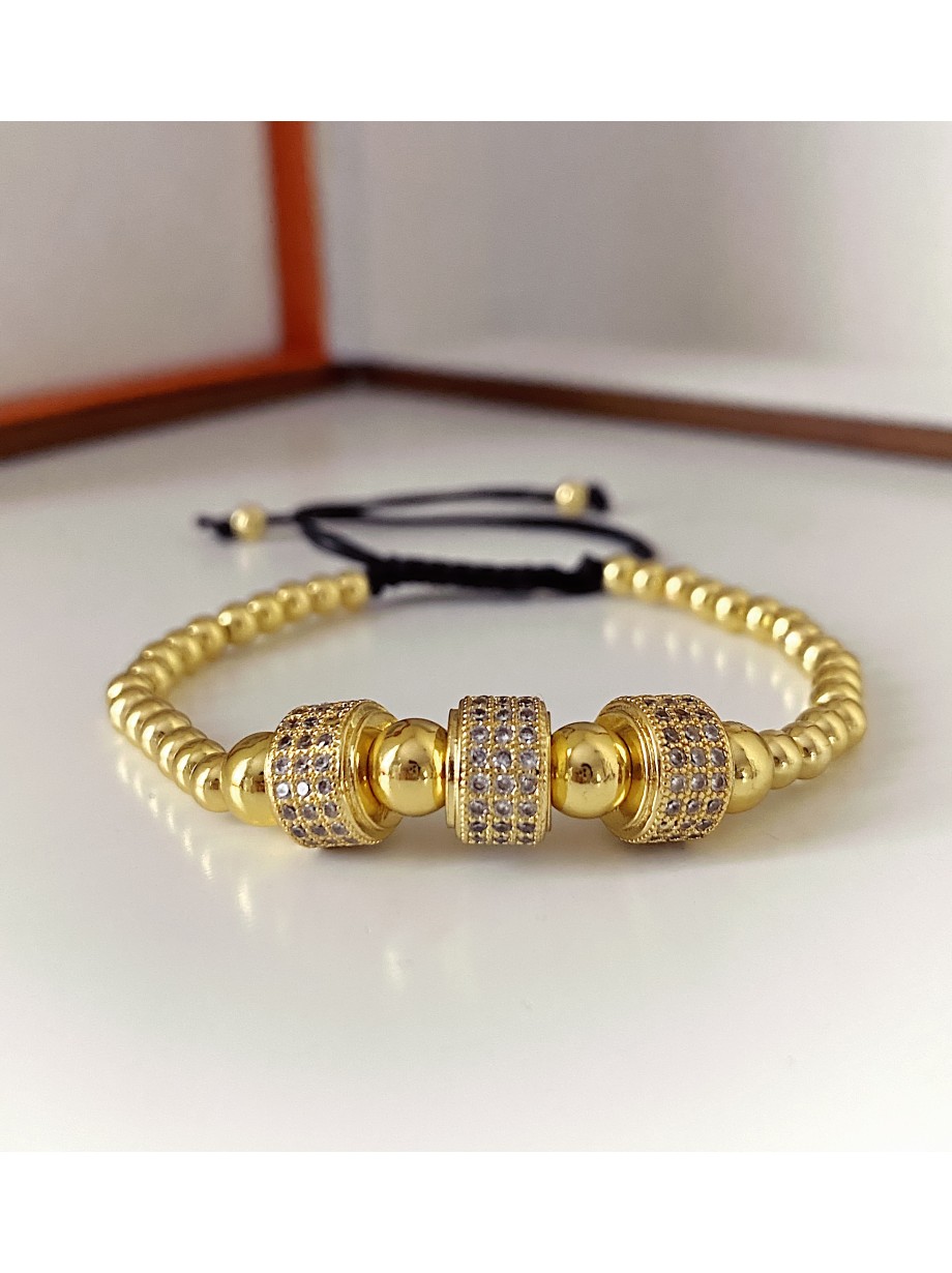 Bratara dama model deosebit cu margele aurii si cercuri cu pietricele stralucitoare