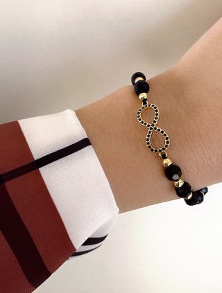 Bratara dama model deosebit cu margele negre si infinit cu pietricele stralucitoare