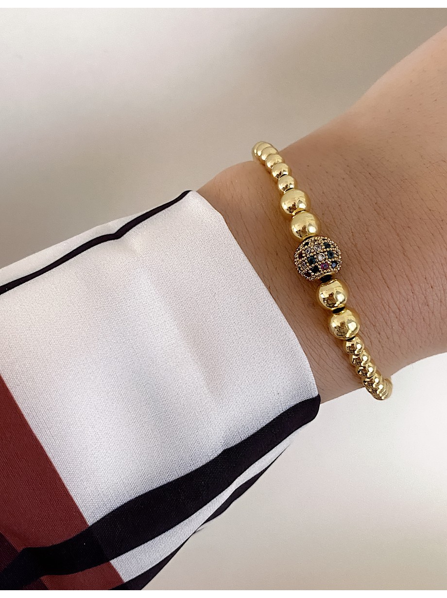 Bratara dama model deosebit cu margele aurii si biluta cu pietricele verzi