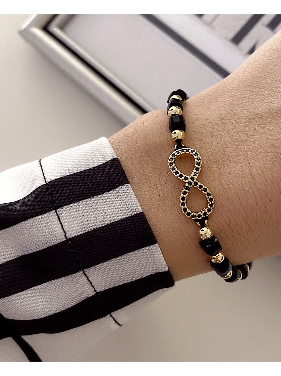 Bratara dama model deosebit cu margele negre cu auriu si infinit cu pietricele stralucitoare