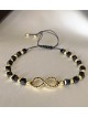 Bratara dama model deosebit cu margele negre cu auriu si infinit cu pietricele stralucitoare