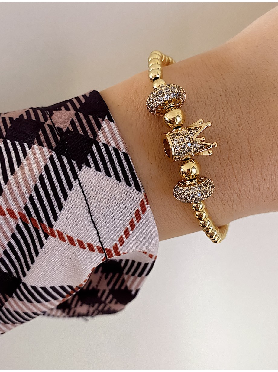 Bratara dama model deosebit cu margele aurii si coroana cu pietricele albe