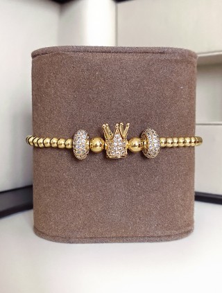 Bratara dama model deosebit cu margele aurii si coroana cu pietricele albe