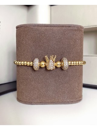 Bratara dama model deosebit cu margele aurii si coroana cu pietricele albe