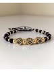 Bratara dama model deosebit cu margele negre cu auriu si 3 romburi cu pietricele negre
