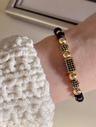 Bratara dama model deosebit cu margele negre cu auriu si forme cu pietricele stralucitoare
