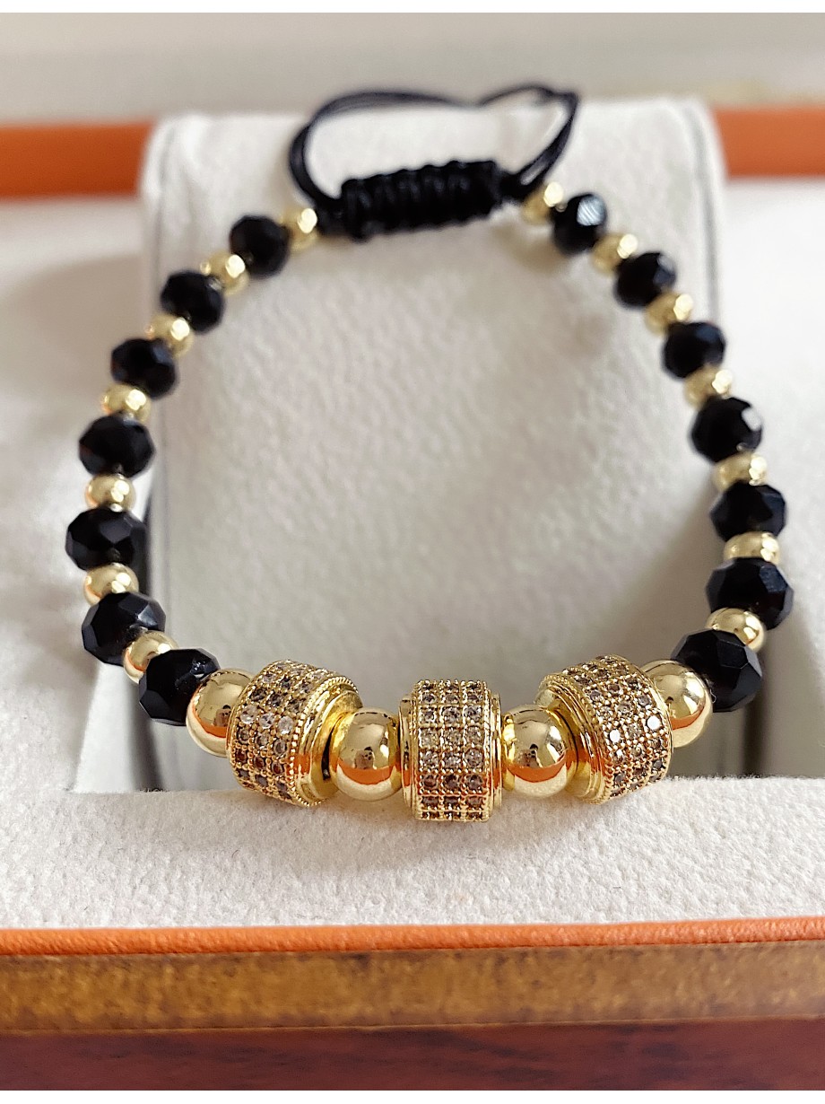 Bratara dama model deosebit cu margele negre cu auriu si cercuri cu pietricele stralucitoare