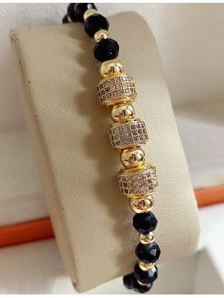 Bratara dama model deosebit cu margele negre cu auriu si cercuri cu pietricele stralucitoare