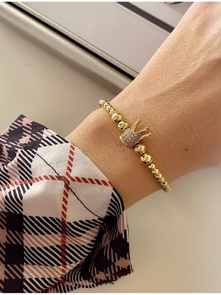 Bratara dama model deosebit cu margele aurii si coroana cu pietricele albe