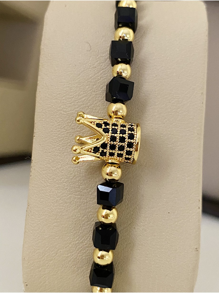 Bratara dama model deosebit cu margele aurii si negre si coroana cu pietricele negre