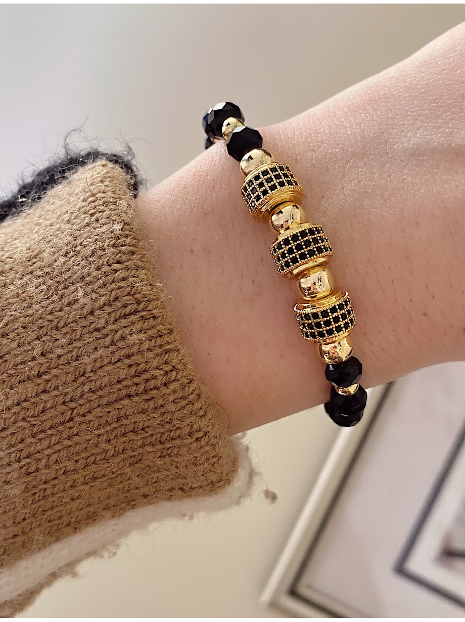 Bratara dama model deosebit cu margele aurii si cercuri cu pietricele stralucitoare