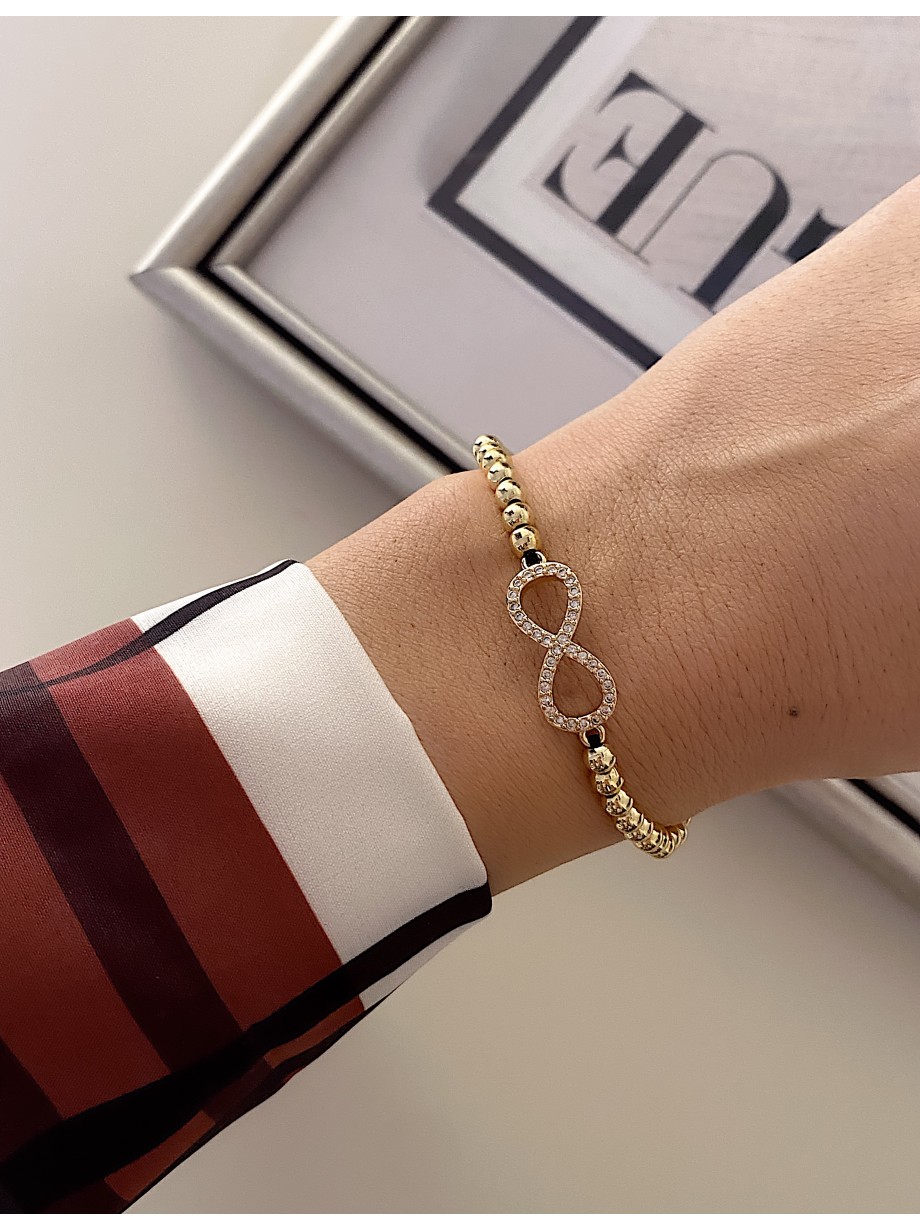 Bratara dama model deosebit cu margele aurii si infinit cu pietricele stralucitoare