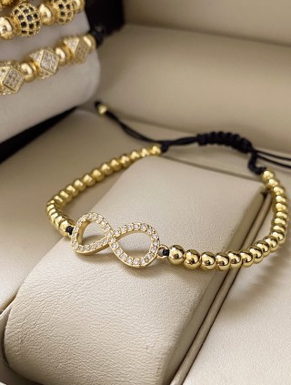 Bratara dama model deosebit cu margele aurii si infinit cu pietricele stralucitoare
