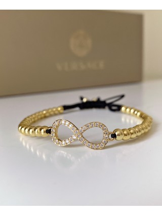 Bratara dama model deosebit cu margele aurii si infinit cu pietricele stralucitoare