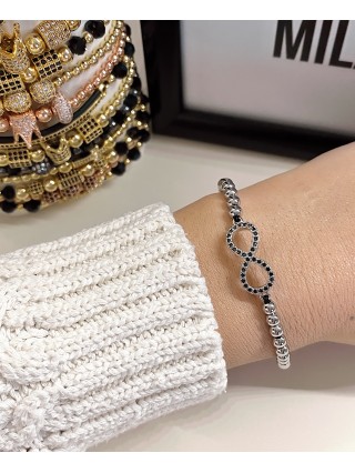 Bratara dama model deosebit cu margele aurii si infinit cu pietricele stralucitoare