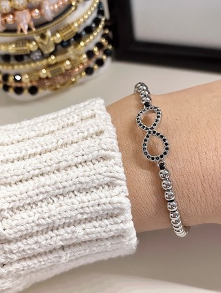 Bratara dama model deosebit cu margele aurii si infinit cu pietricele stralucitoare