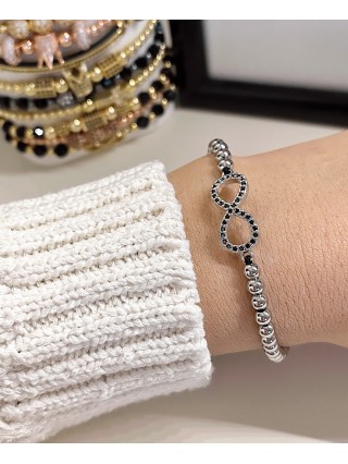 Bratara dama model deosebit cu margele aurii si infinit cu pietricele stralucitoare