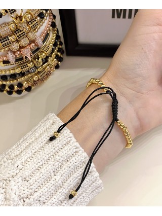 Bratara dama model deosebit cu margele aurii si biluta cu pietricele albe