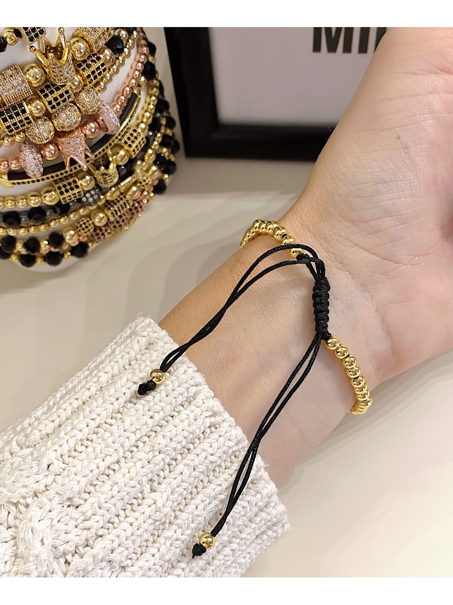 Bratara dama model deosebit cu margele aurii si biluta cu pietricele albe