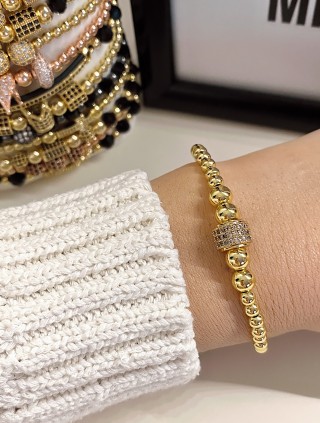 Bratara dama model deosebit cu margele aurii si biluta cu pietricele albe