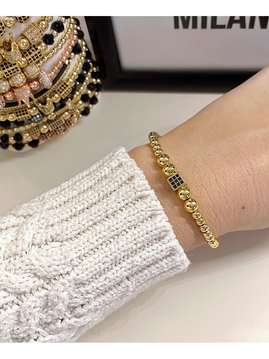 Bratara dama model deosebit cu margele aurii si patrat cu pietricele negre