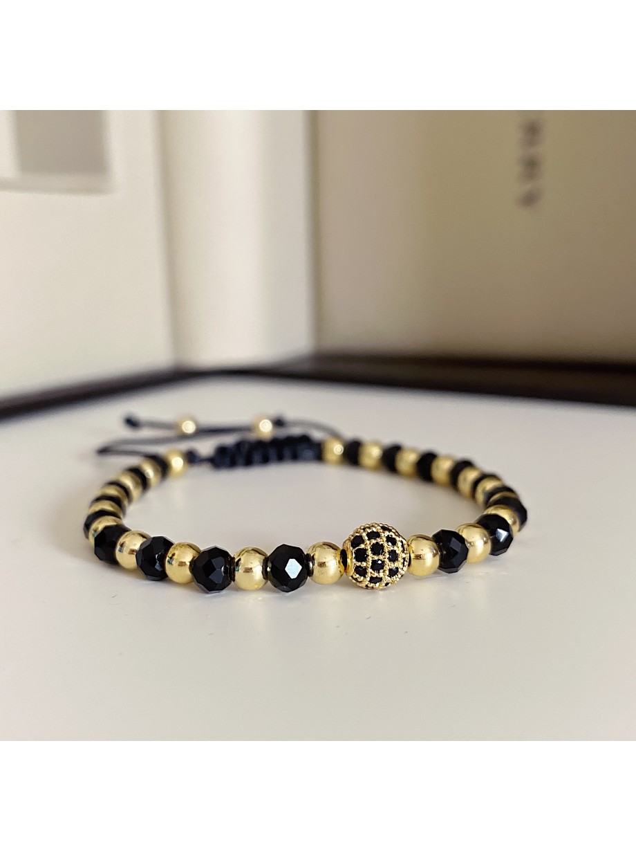 Bratara dama model deosebit cu margele aurii si negre si biluta cu pietricele negre