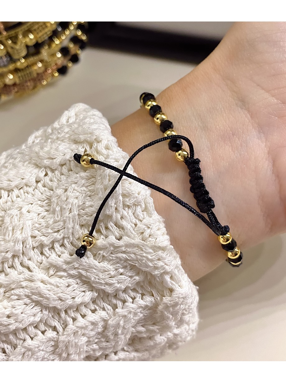 Bratara dama model deosebit cu margele aurii si negre si biluta cu pietricele negre