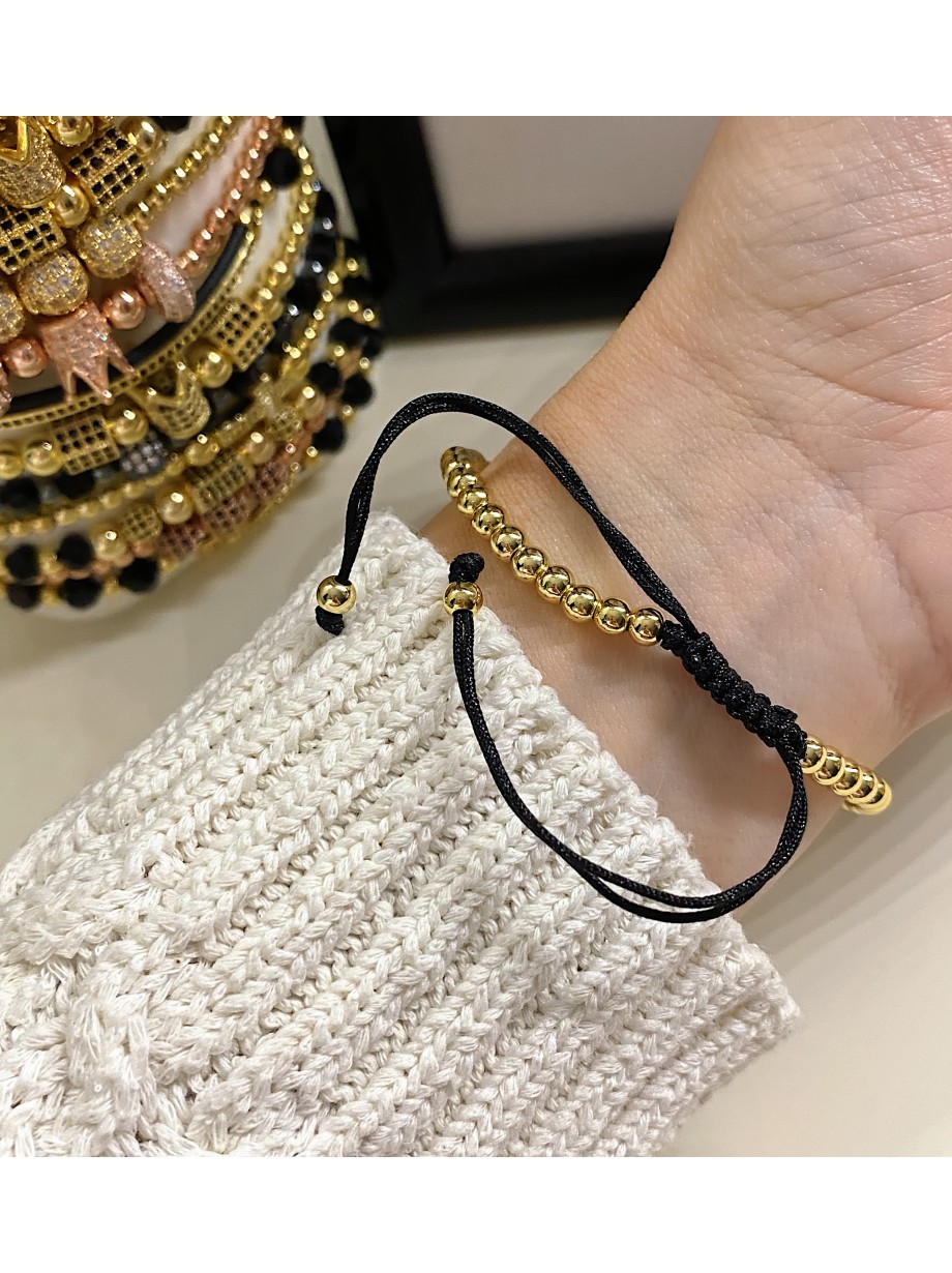 Bratara dama model deosebit cu margele aurii si coroana cu pietricele stralucitoare