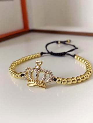 Bratara dama model deosebit cu margele aurii si coroana cu pietricele stralucitoare