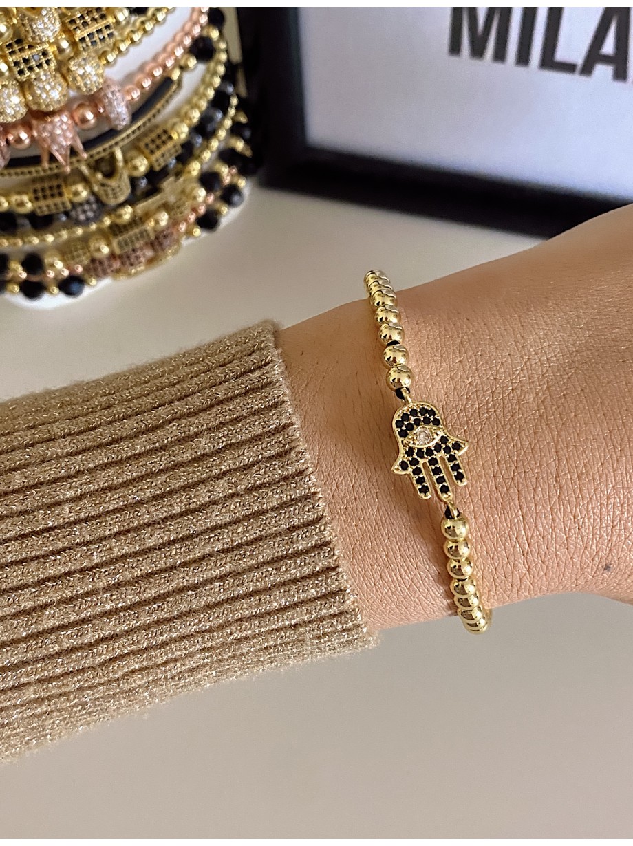 Bratara dama model deosebit cu margele aurii si palma cu pietricele negre