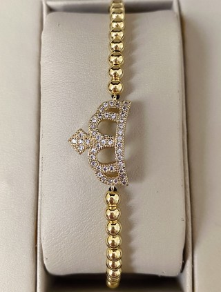 Bratara dama model deosebit cu margele aurii si coroana cu pietricele stralucitoare