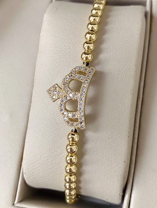 Bratara dama model deosebit cu margele aurii si coroana cu pietricele stralucitoare