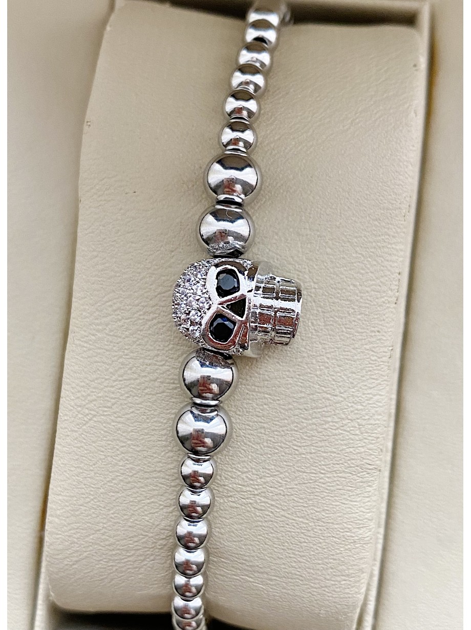 Bratara dama model deosebit cu margele argintii si craniu argintiu