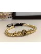 Bratara dama model deosebit cu margele aurii si biluta cu pietricele negre
