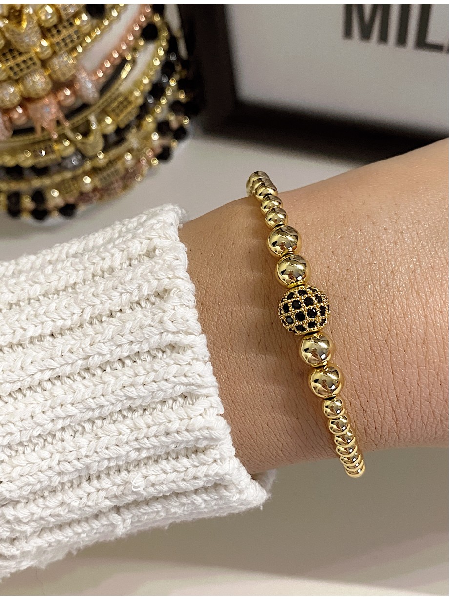 Bratara dama model deosebit cu margele aurii si biluta cu pietricele negre