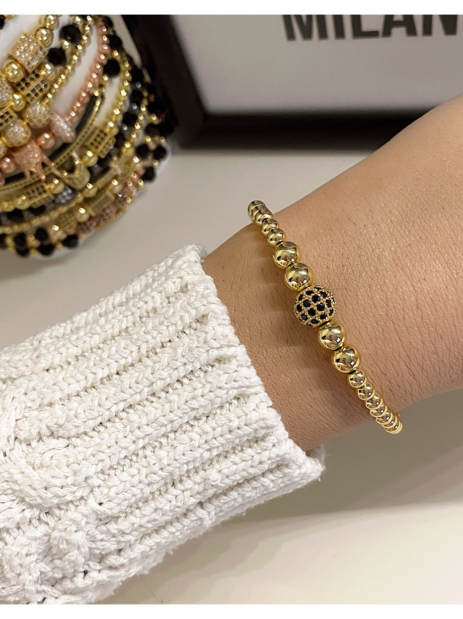 Bratara dama model deosebit cu margele aurii si biluta cu pietricele negre