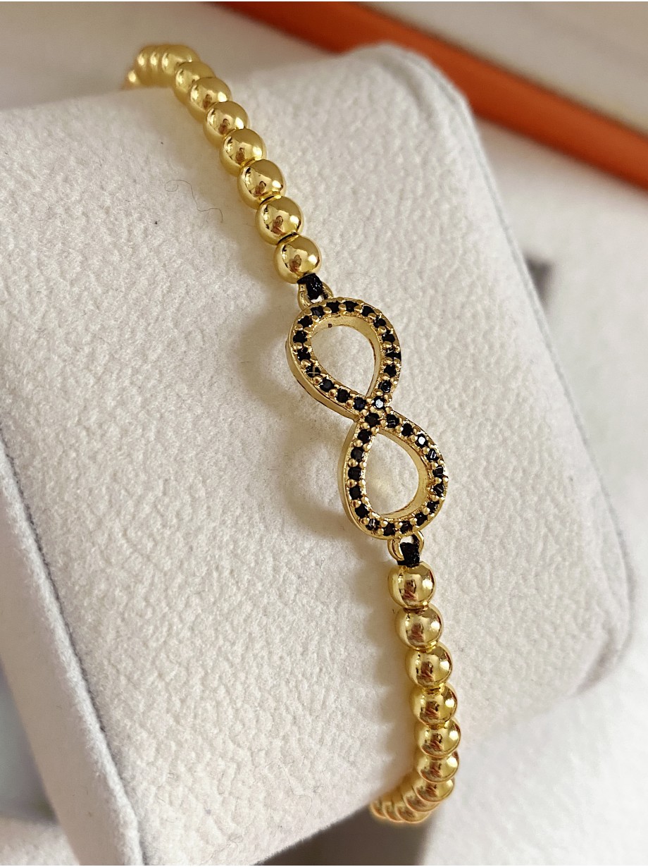 Bratara dama model deosebit cu margele aurii si infinit cu pietricele negre