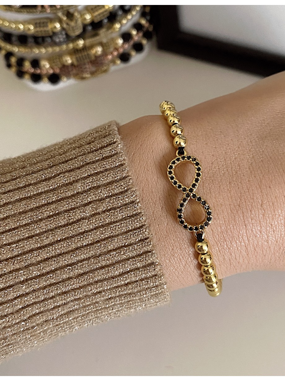 Bratara dama model deosebit cu margele aurii si infinit cu pietricele negre