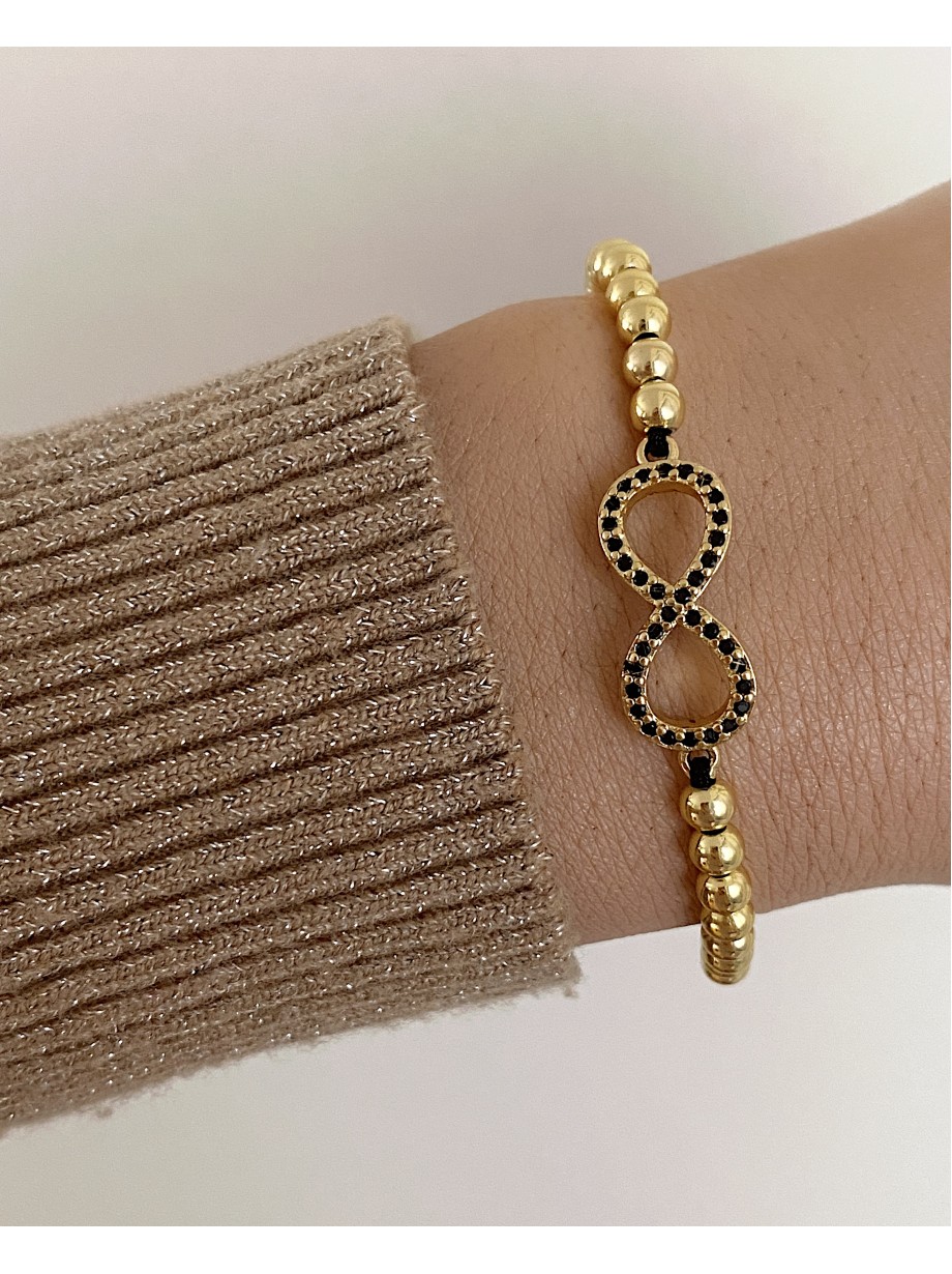Bratara dama model deosebit cu margele aurii si infinit cu pietricele negre