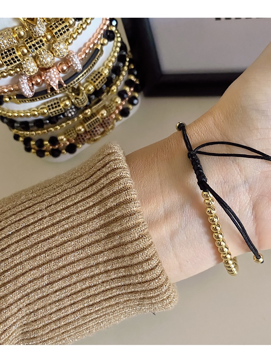 Bratara dama model deosebit cu margele aurii si 3 bilute