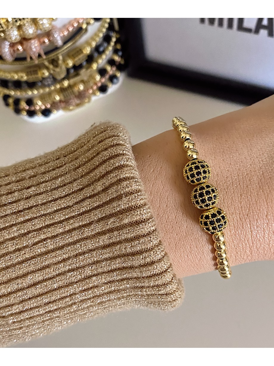 Bratara dama model deosebit cu margele aurii si 3 bilute