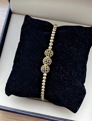 Bratara dama model deosebit cu margele aurii si 3 bilute