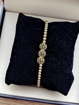 Bratara dama model deosebit cu margele aurii si 3 bilute