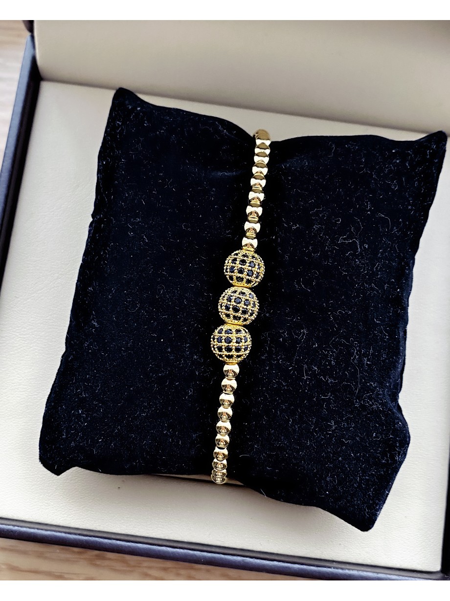 Bratara dama model deosebit cu margele aurii si 3 bilute