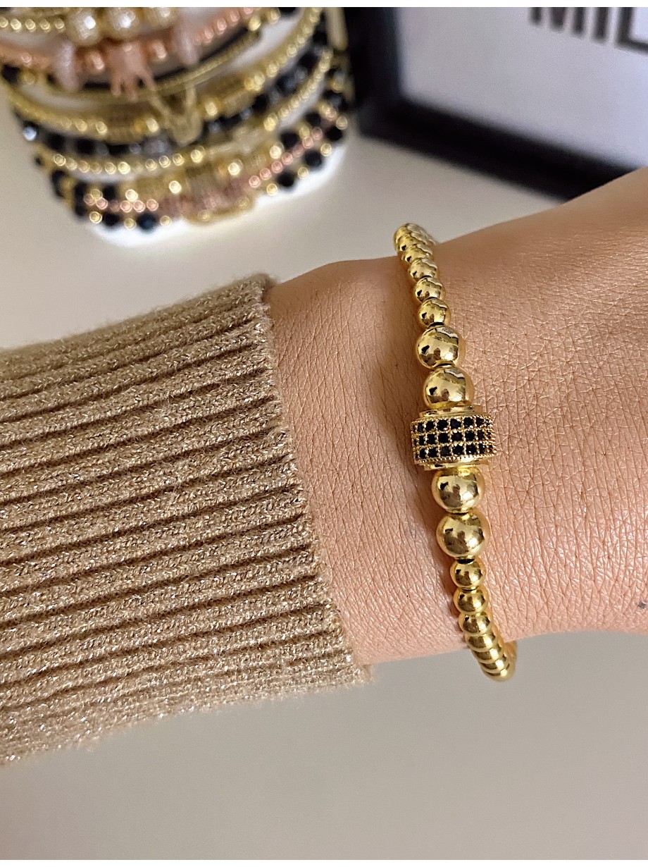 Bratara dama model deosebit cu margele aurii si biluta cu pietricele negre