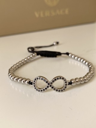 Bratara dama model deosebit cu margele argintii si infinit cu pietricele negre