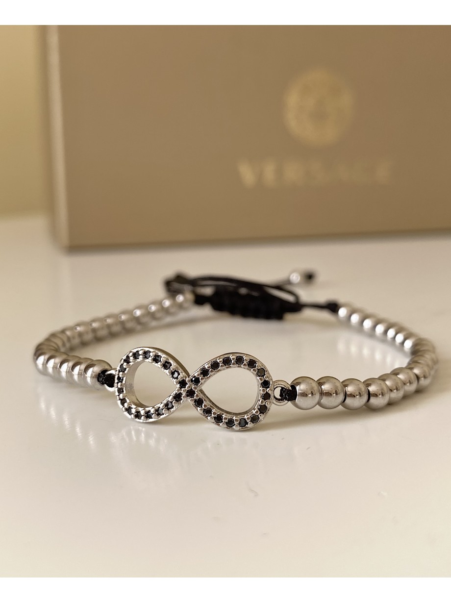 Bratara dama model deosebit cu margele argintii si infinit cu pietricele negre