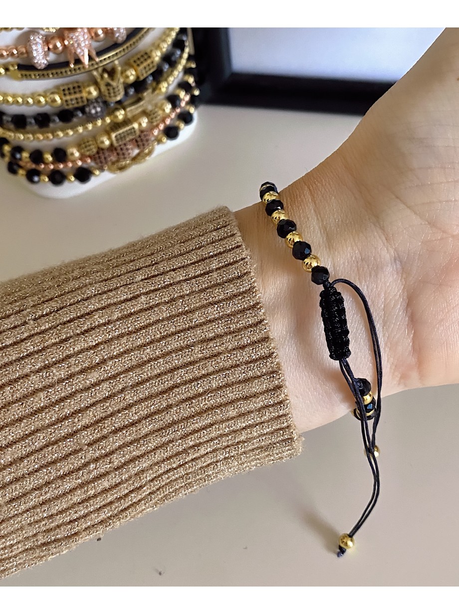 Bratara dama model deosebit cu margele aurii si negre simpla