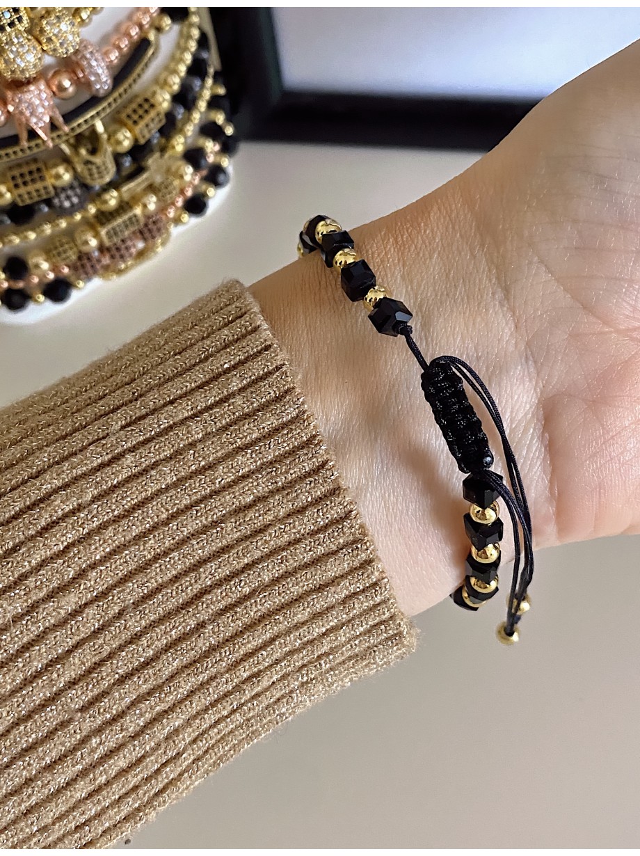 Bratara dama model deosebit cu margele aurii si negre simpla